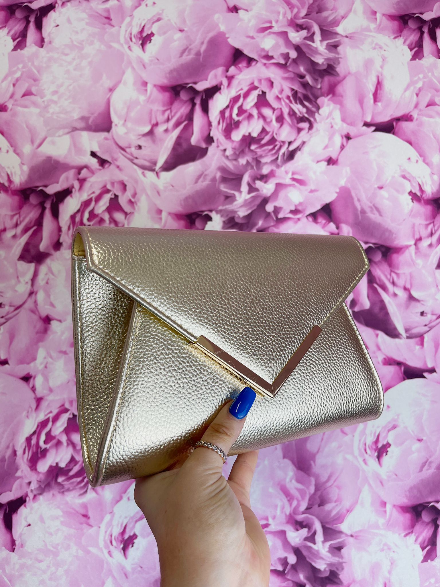 Rose gold envelope clutch on sale bag