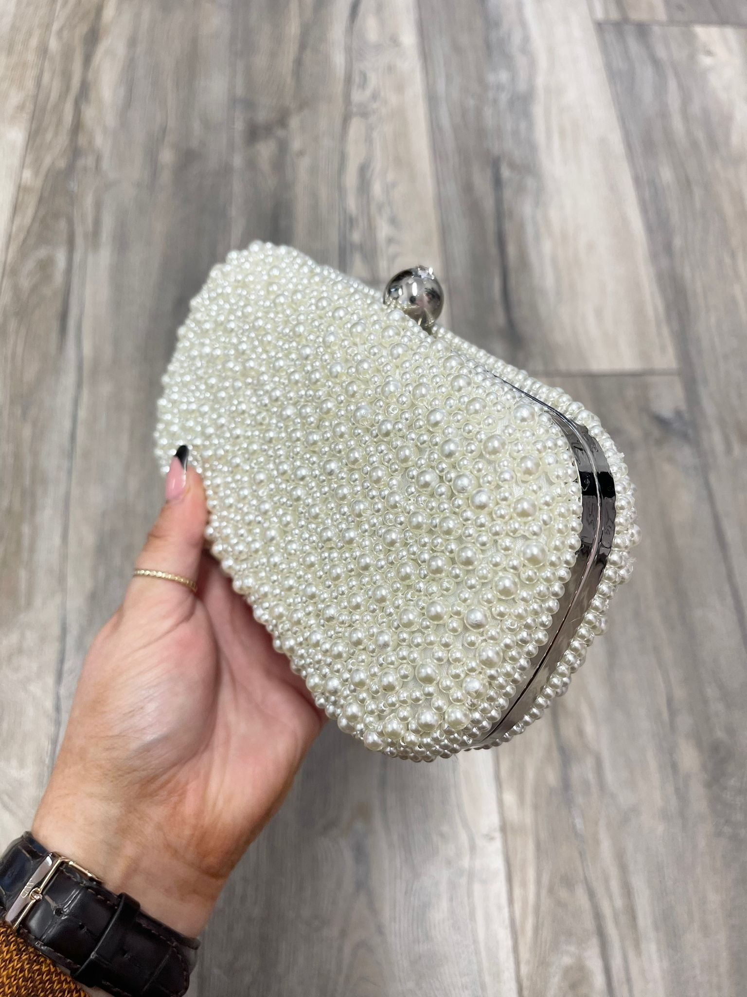 Pearl bag store clutch